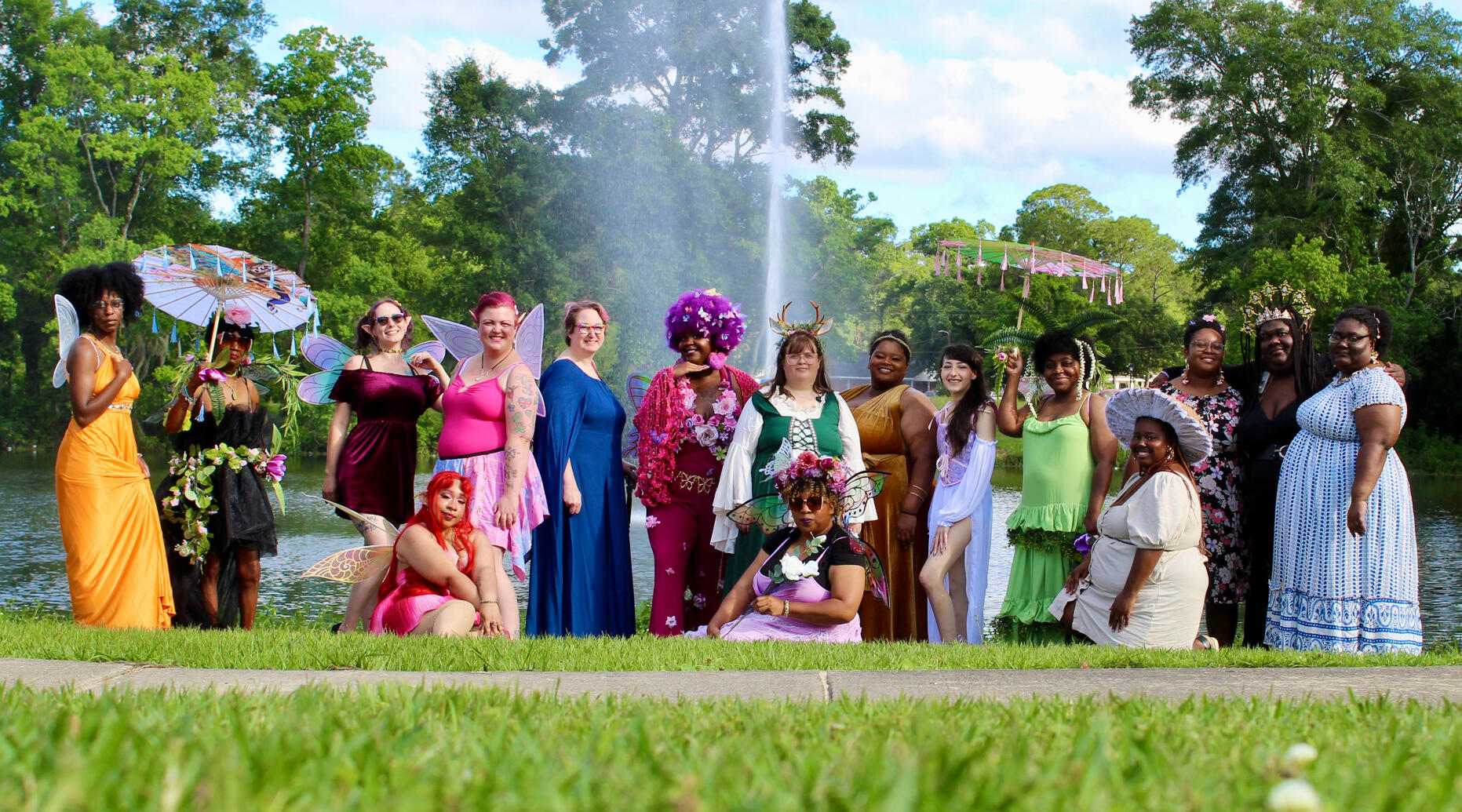 Group shot of black fae day participants fill the frame in various states of costume ad dress.
